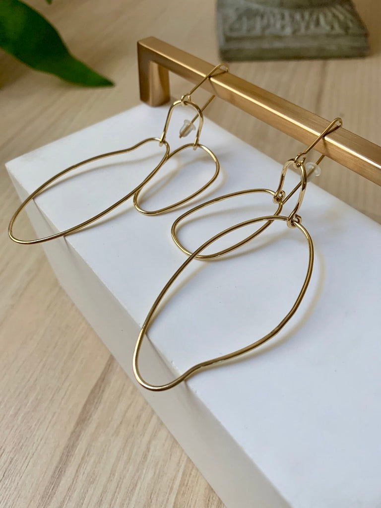 Asymmetrical gold plated earrings