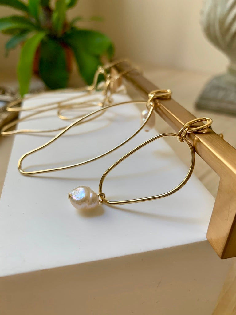 Asymmetrical gold plated earrings