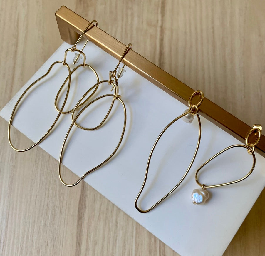 Asymmetrical gold plated earrings